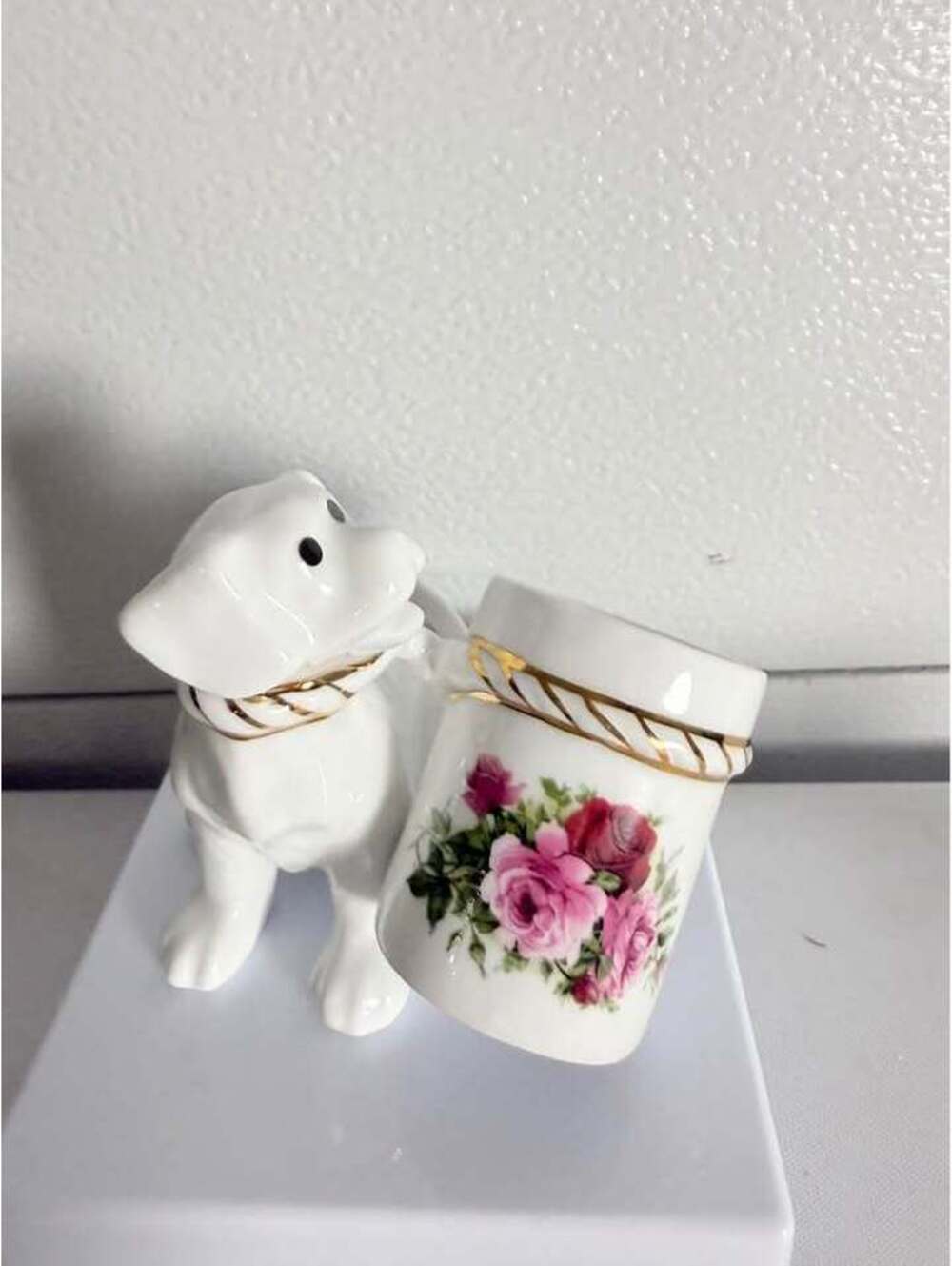 Vintage Porcelain Dog Figurine with Floral Pot or toothpick holder